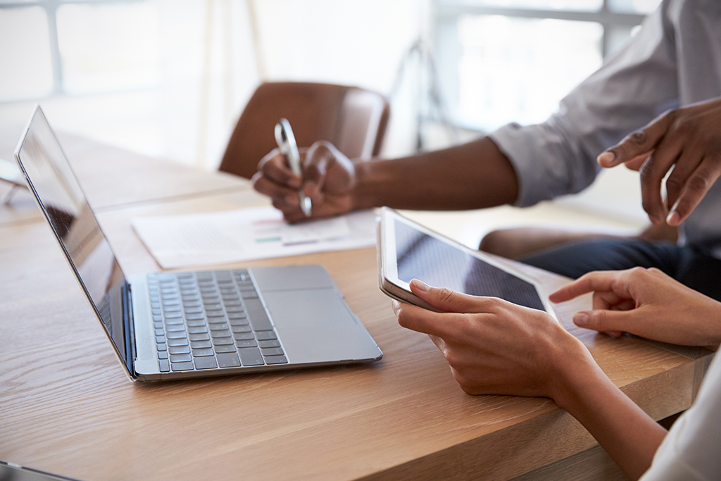 Two people working at a desk