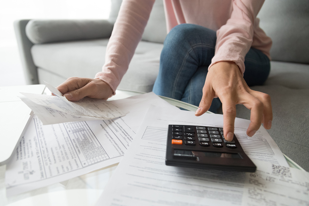 Woman working on financial records